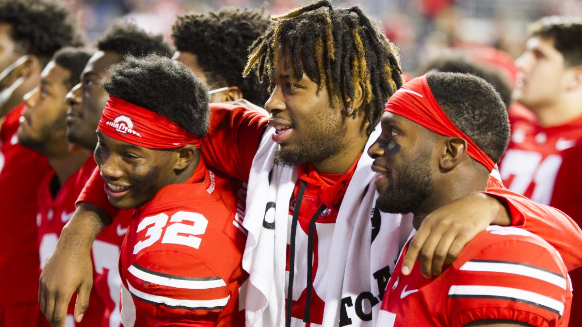 82. Jakailin Johnson, Jaylen Johnson and Marcus Williamson